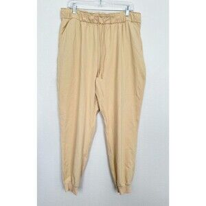 Lululemon Stretch High Rise Jogger in Beige Athleisure Tapered Pocket Women's 14